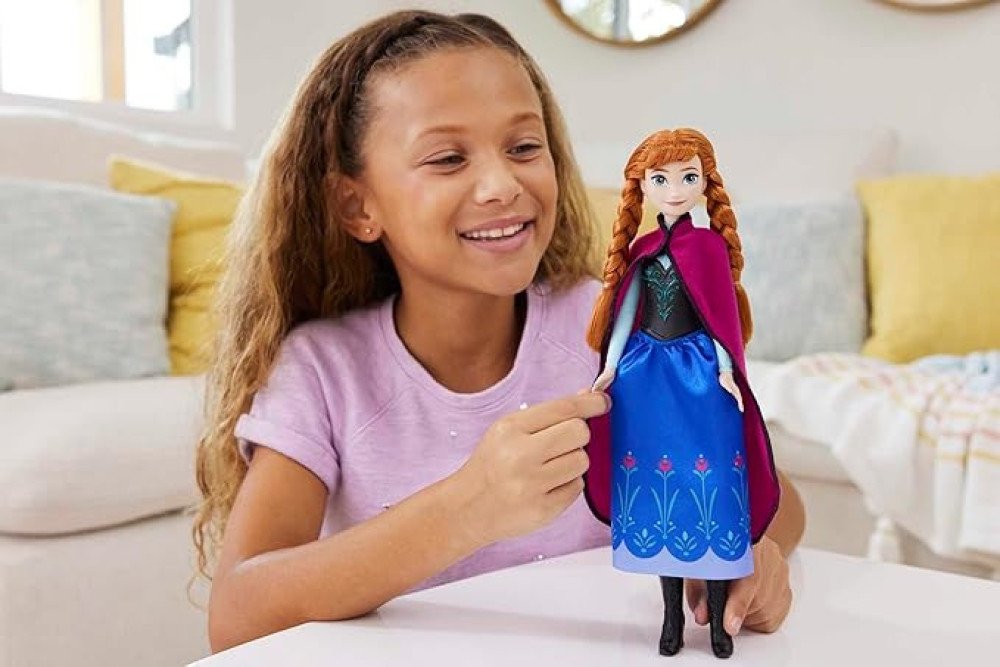 Mattel Disney Frozen Toys, Anna Fashion Doll & Accessory with Signature Look, Inspired by the Movie